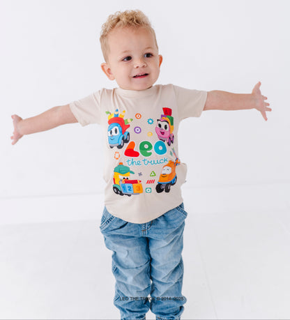Toddler boy wearing a bamboo t-shirt with Leo the Truck and crew graphic on a white background