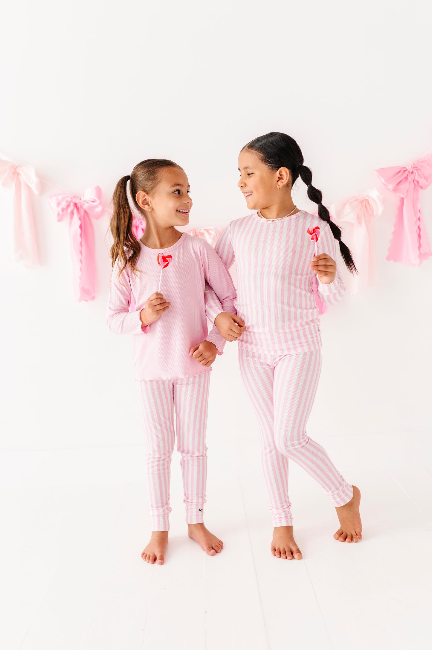 Lightweight pink ribbed top for toddlers with stretchy comfortable fit