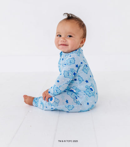 Infant in Care Bears Grumpy Bear sleeper made from ultra-soft bamboo viscose