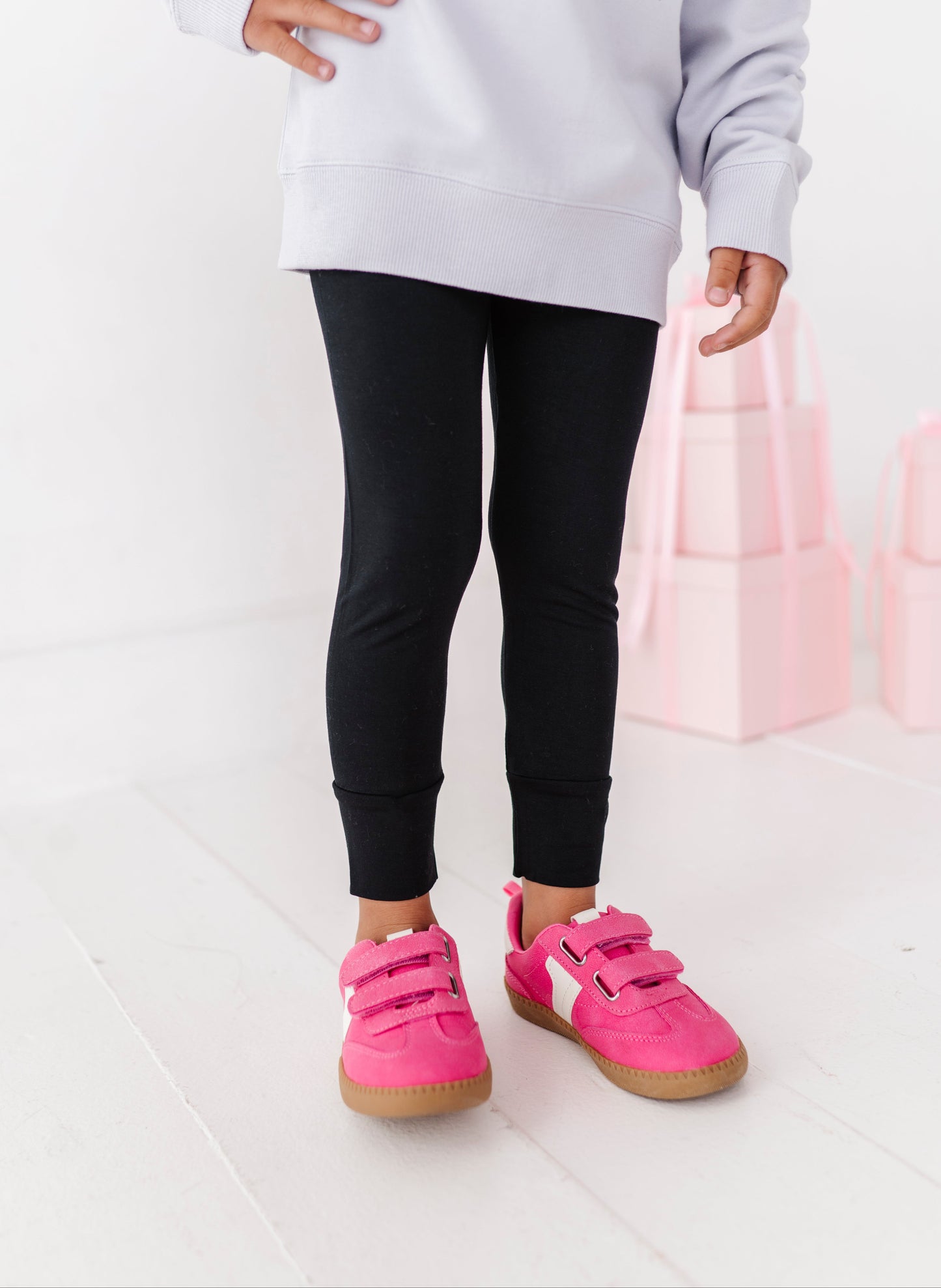 Close-up of jet black bamboo leggings with stretchy, comfortable fit