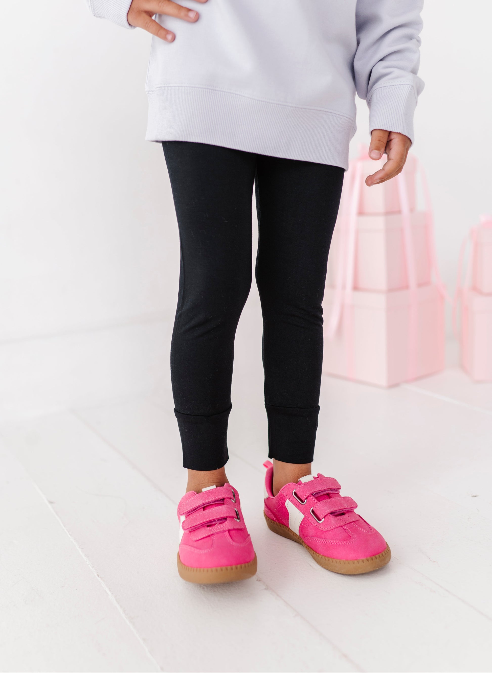 Close-up of jet black bamboo leggings with stretchy, comfortable fit