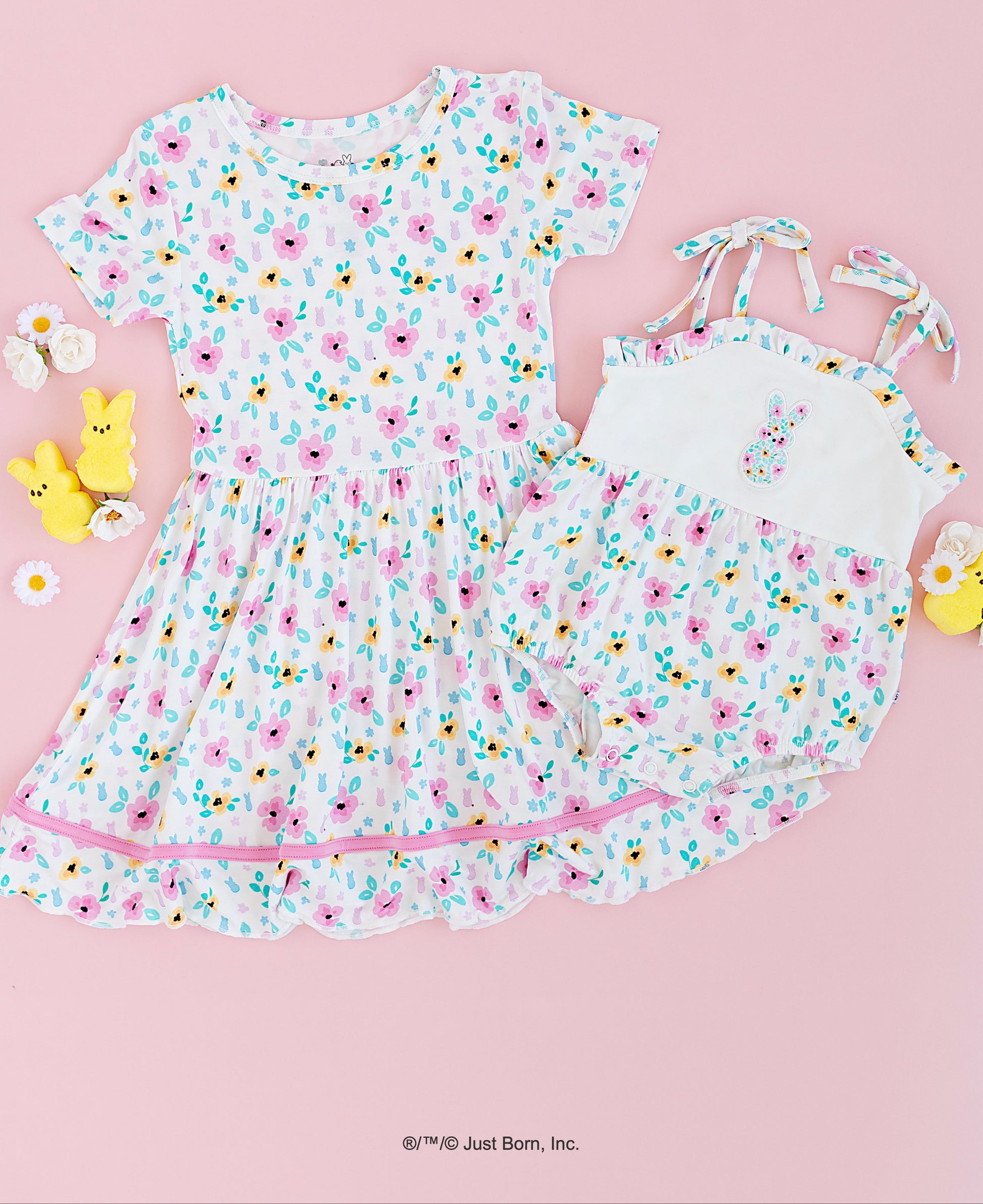 Children's PEEPS® floral dress and matching romper on a pink background with Peeps candy decorations.