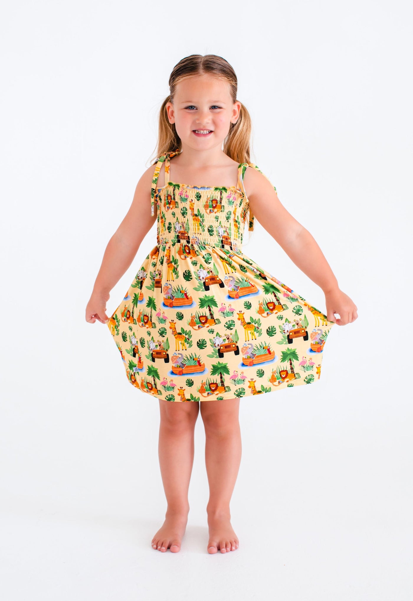 leo smocked birdie dress