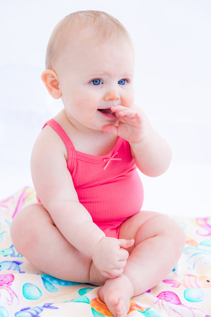 Lightweight bamboo bodysuit tank for infants in strawberry pink