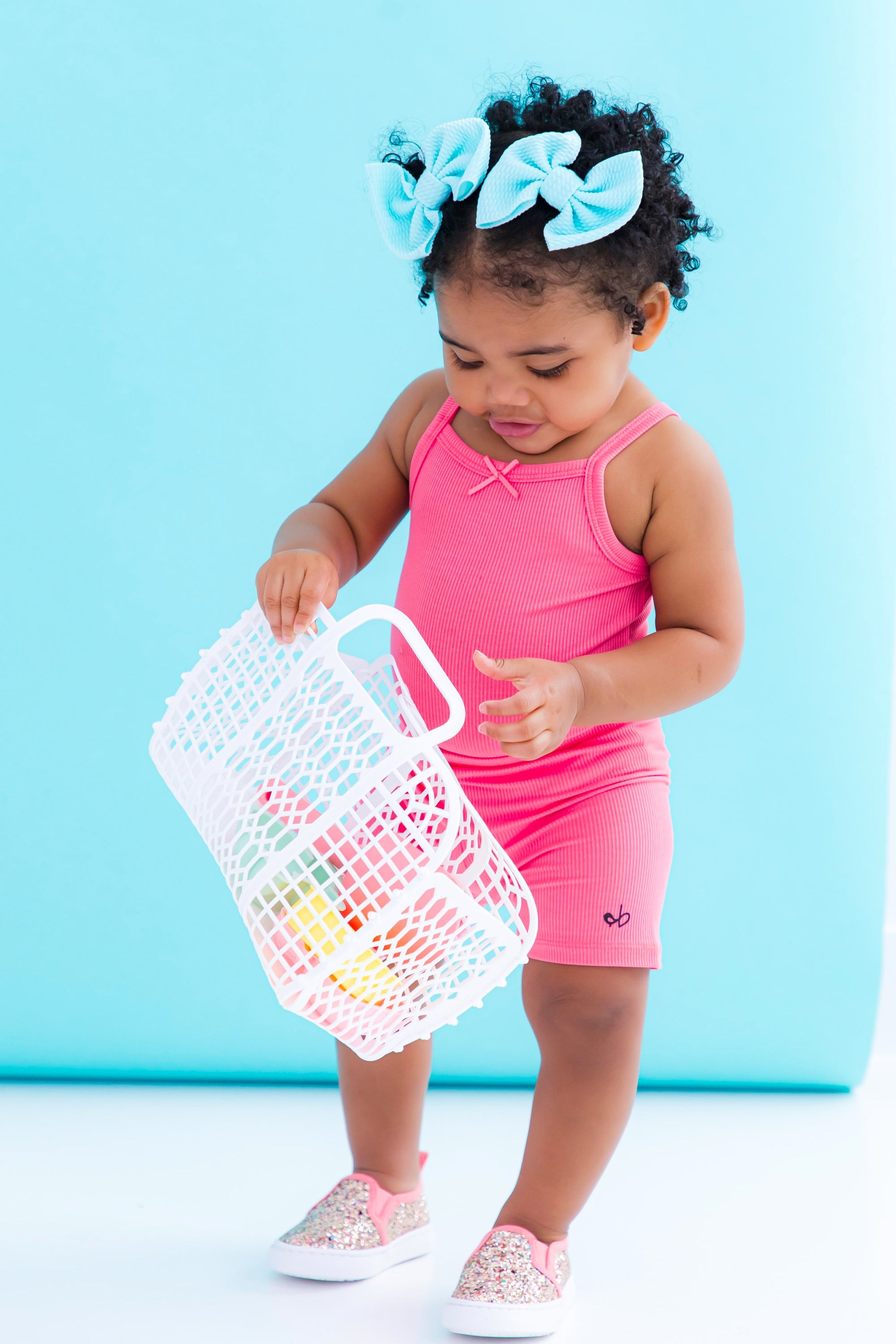Lightweight bamboo bodysuit tank for infants in strawberry pink