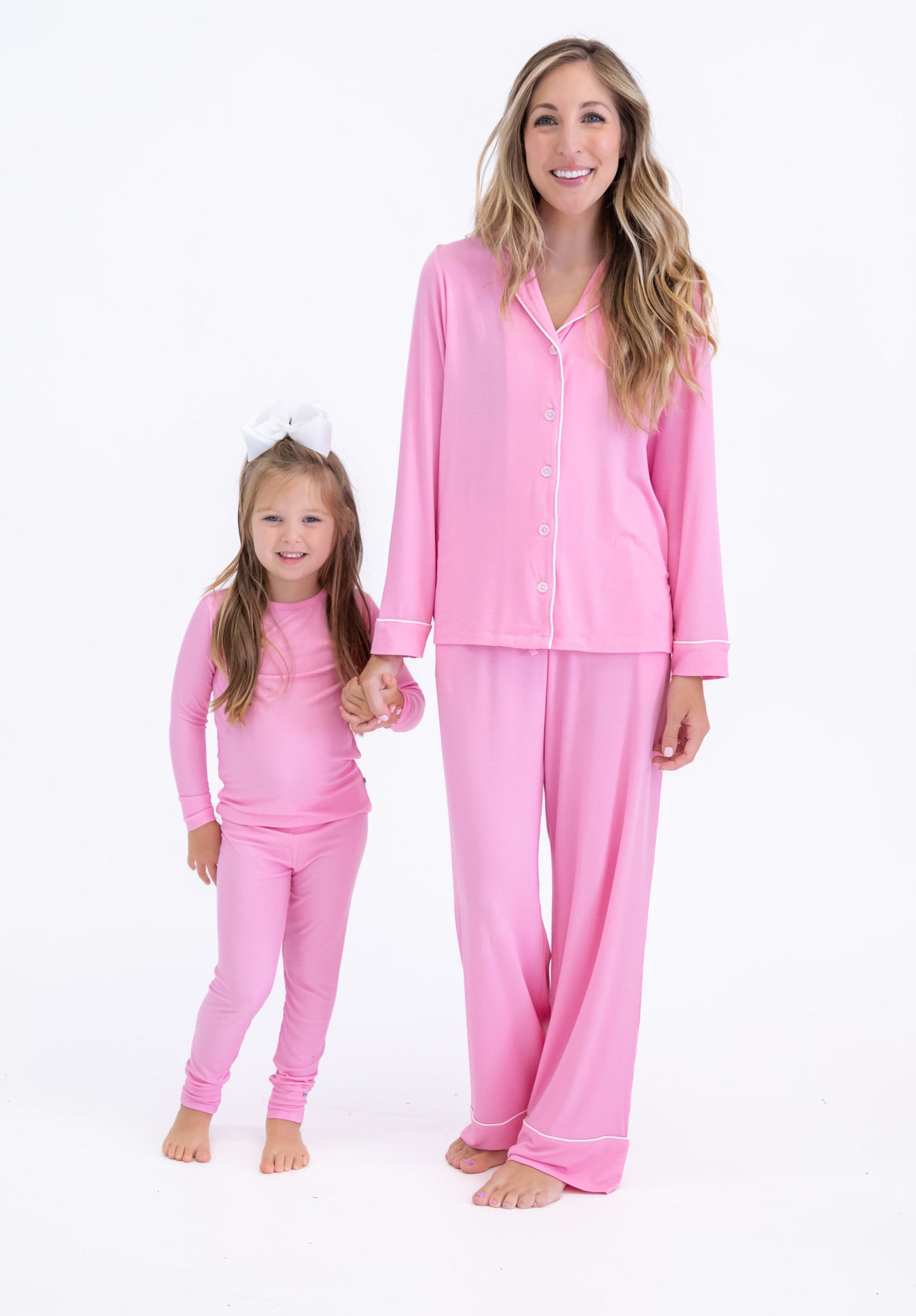 Mama and her mini wearing bubblegum pink pajama sets
