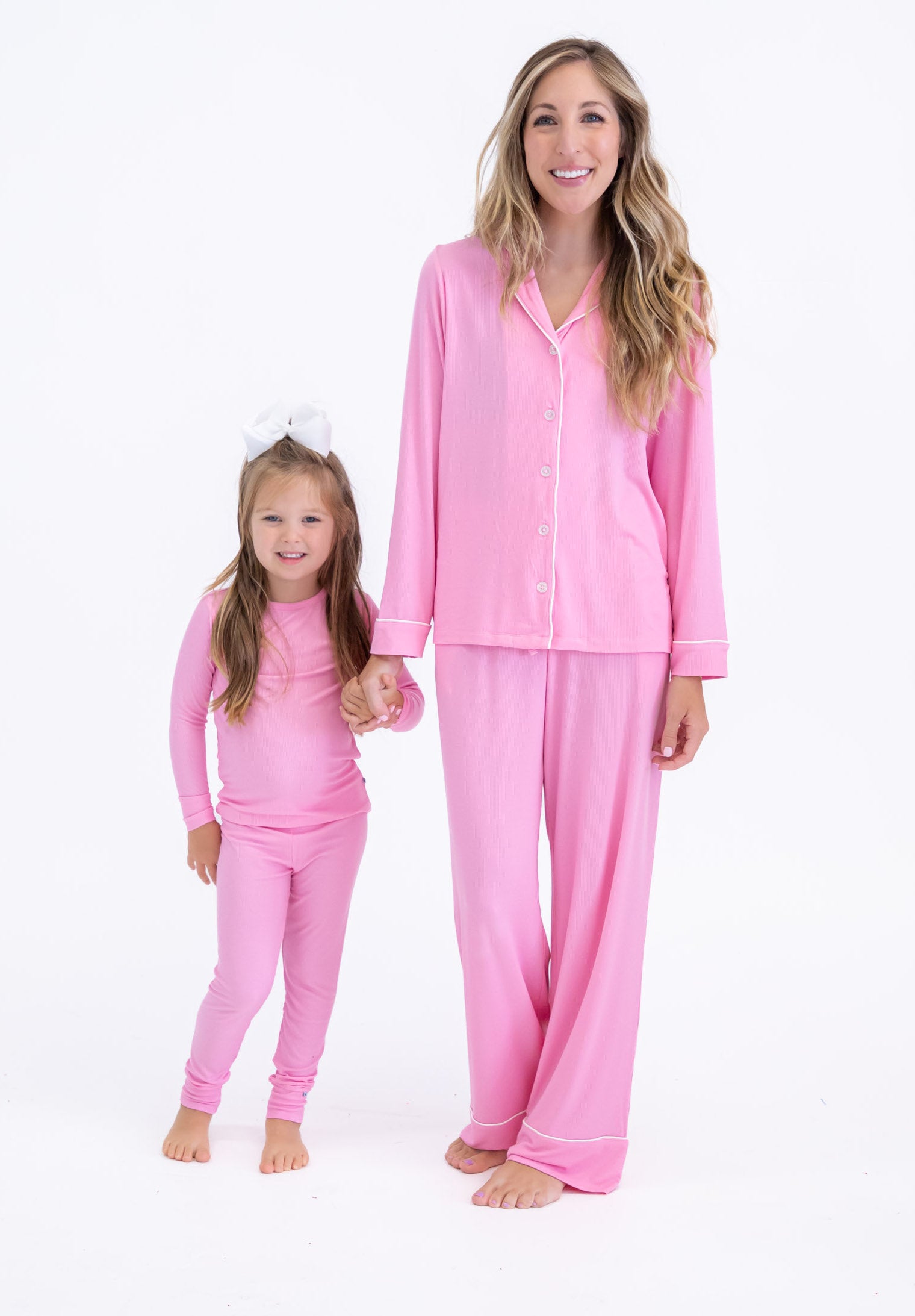 Mama and her mini wearing bubblegum pink pajama sets