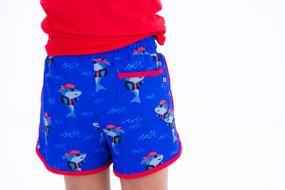 Back view of Sebastian Swim Shorties highlighting functional back pocket, elastic waistband, and shark print