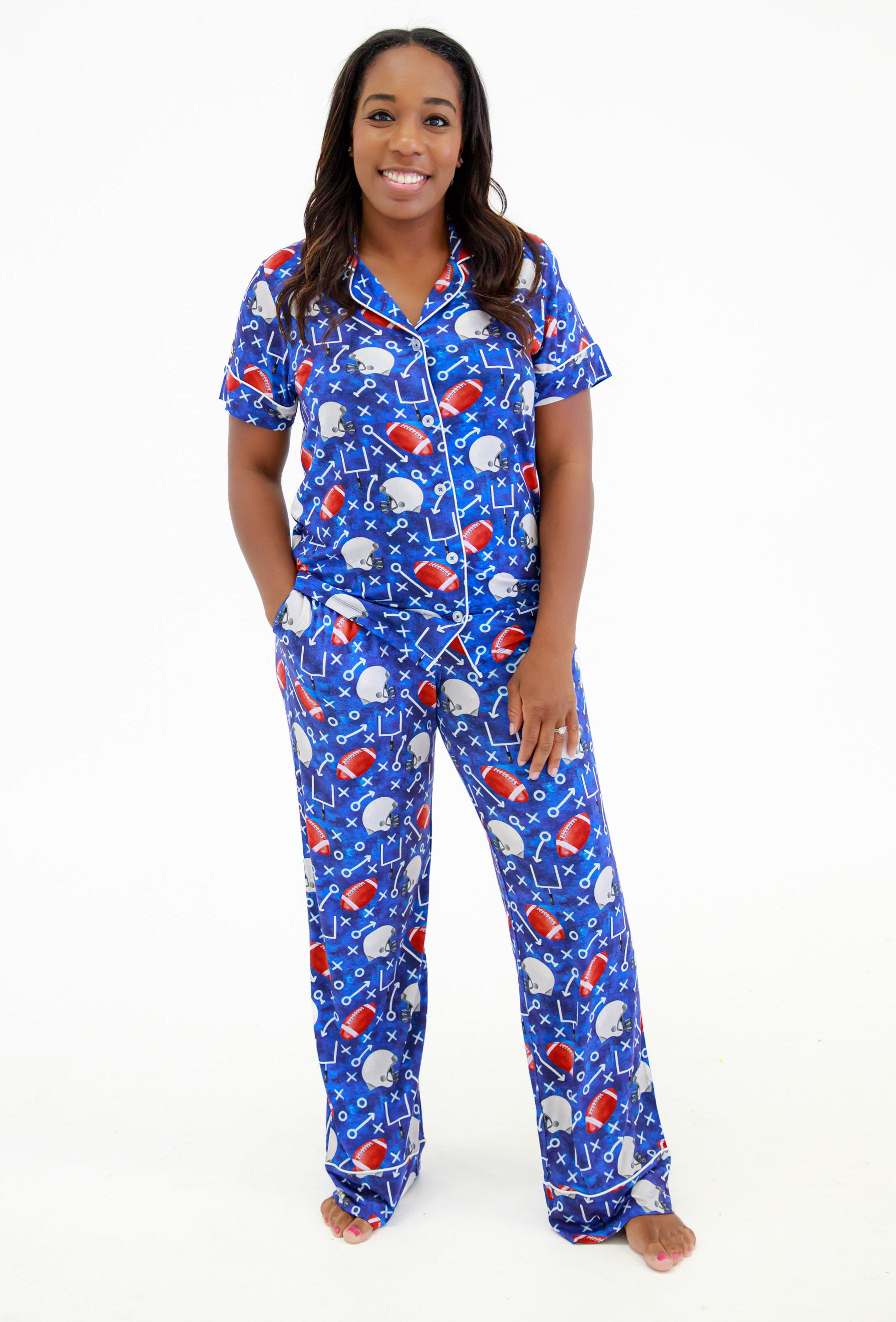 Woman wearing Troy bamboo lounge set with blue football print