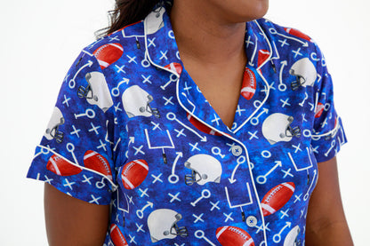 Close-up of bamboo lounge set fabric with football and play print