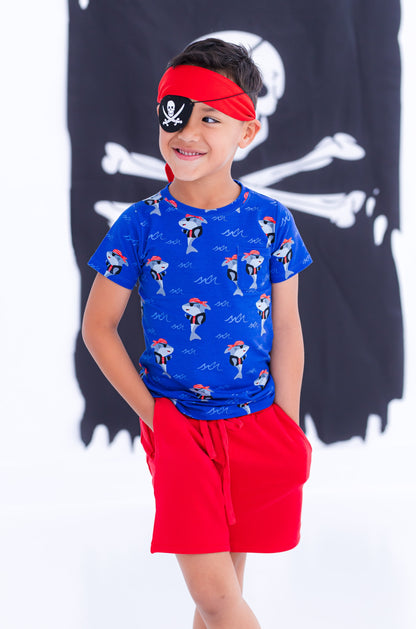 Child wearing Sebastian pirate shark pocket t-shirt styled for play
