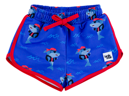 Blue children's swim shorts with shark pattern and red accents on a white background