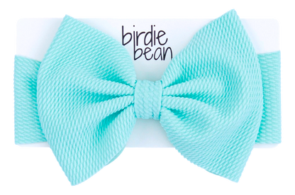 Sky blue bow with 'birdie bean' branding on a white background