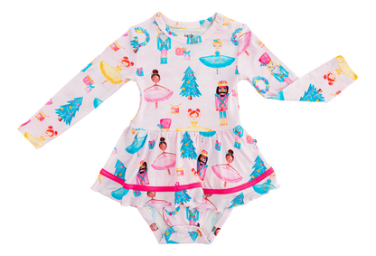 Sugarplum Birdie Twirl baby dress featuring ballerinas, nutcrackers, wreaths, and Christmas trees