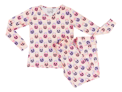Toddler bamboo outfit with long-sleeve top and pants featuring a colorful Halloween pattern on a white background